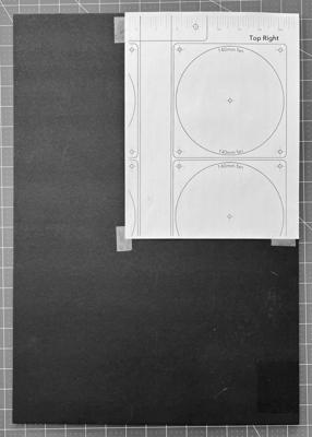 One template page taped to the fan panel