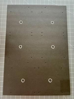 The fan panel with the templates removed. The six fan center points have been highlighted using a metallic Sharpie.