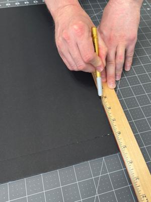 Use your straight-edge and hobby knife to cut out the center of the filter flange.
