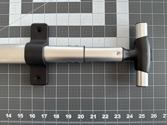 The handle, slightly extended, with all three telescoping tubes visible. When testing the fit below, you'll need to make sure you test both the inner and the middle tube.