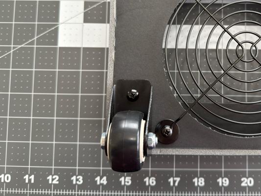 The wheel securely installed on the air purifier.