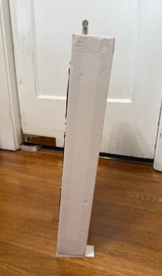 The original carry style prototype, retrofitted with angled feet for improved stability. The angled feet pitch the airpurifier forward 5 degrees, moving the center of mass away from the back edge and improving stability.