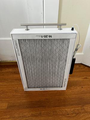 Front view of the original carry style prototype. This design was particularly prone to tipping over backwards due to the uneven weight distribution created by the fans. This design was slightly thinner at only 3" thick.