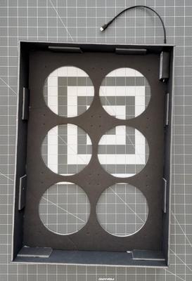 Dry-fitting the fan speed controller inside the purifier box on a carry style build.