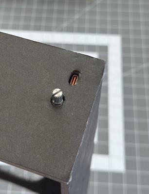 The holes cut out for the speed knob post and USB-C port.