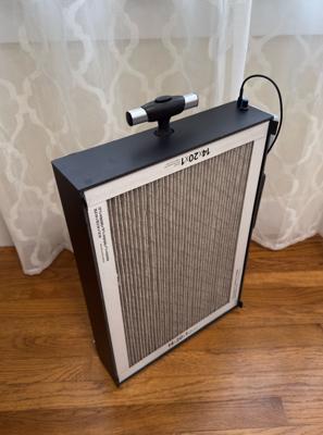 Front view of a rolling luggage style build made out of heavy duty, plastic-faced Ultraboard Classic. This material is more durable than paper-faced foam board, but is harder to source and much more difficult to work with.