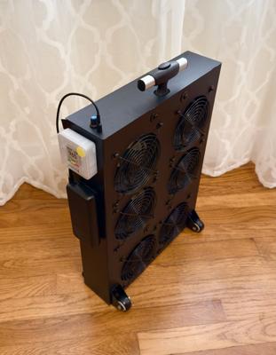 Rear view of a rolling luggage style build made out of heavy duty, plastic-faced Ultraboard Classic with an Aranet CO2 meter attached.