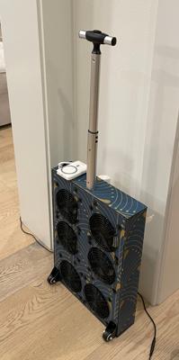 A beta tester's rolling luggage style build with printed vinyl wrap applied to the foam board and the telescoping luggage handle extended.